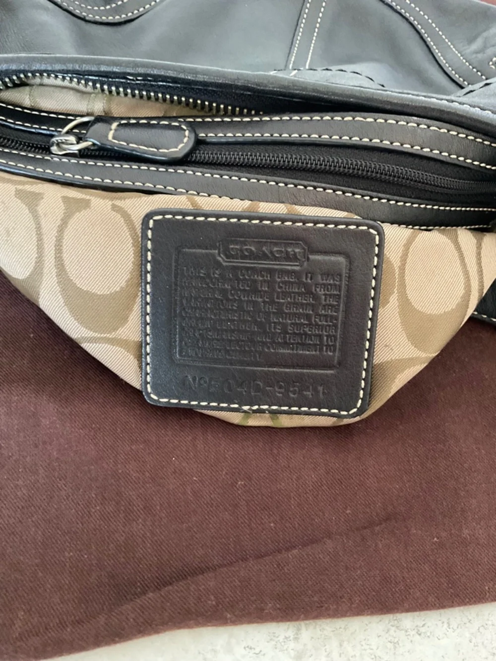 Coach Black Leather Curved Hobo Bag with Silver Hardware